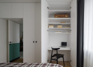Desk In White Wardrobe In Bedroom